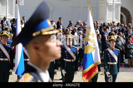 Moscow, Russia. 07th May, 2018. Russian President Vladimir Putin watches a review of the Presidential Regiment to mark his fourth inauguration on Cathedral Square in the Kremlin Grand Palace May 7, 2018 in Moscow, Russia. Putin was sworn-in for the forth time as the President of the Russian Federation. (Kremlin Pool via Credit: Planetpix/Alamy Live News Stock Photo