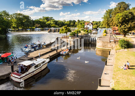 Reading, England, UK - August 29, 2016: The weir and lock on the River Thames at Goring in Oxfordshire. Stock Photo