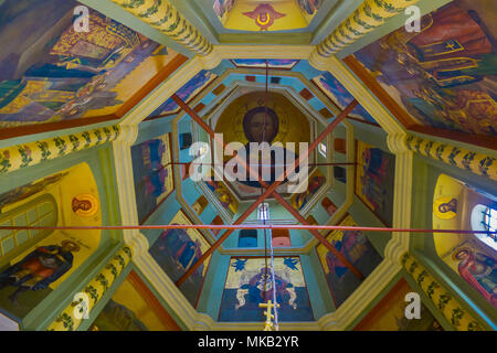 MOSCOW, RUSSIA- APRIL, 29, 2018: Interior view of carved wall and colorful paints inside of St. Basil's Cathedral on Red square Stock Photo