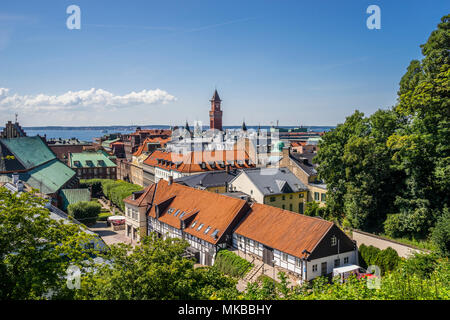 view over the roofs of the Baltic Sea coastal city of Helsingborg from the Kärnan medieval fortress with the tower of the Radhuset, the Helsingborg Ci Stock Photo