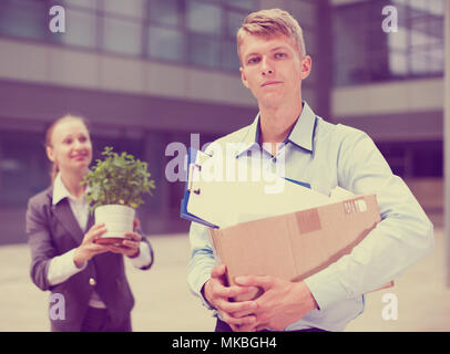 Smilling businessman is pending of rest outdoor. Stock Photo