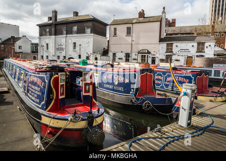 Colourful narrow canal boats on Gas Street Basin Stock Photo