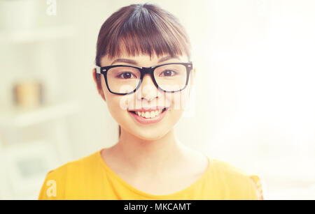 happy asian young woman in glasses at home Stock Photo