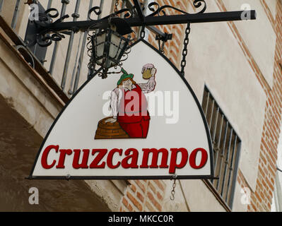 Seville, Spain - April 6, 2015: Sign in street in Seville, Spain, advertising a Spanish beer called 'Cruzcampo' Stock Photo