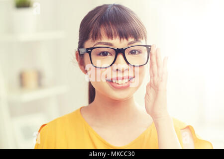 happy asian young woman in glasses at home Stock Photo