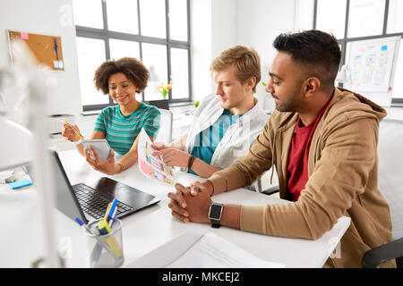 creative office workers discussing user interface Stock Photo