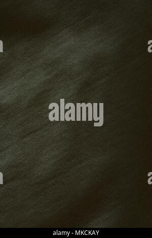 dark green fabric cloth background texture close up Stock Photo