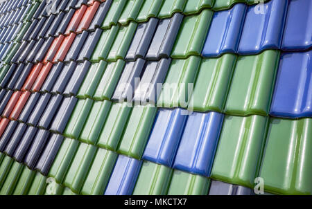 Colorful ceramic roof tiles, abstract background. Stock Photo