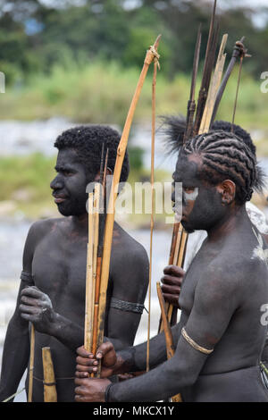 Wamena, Papua, Indonesia, 8/9/2016: Dani warriors at the Baliem Valley Festival Stock Photo