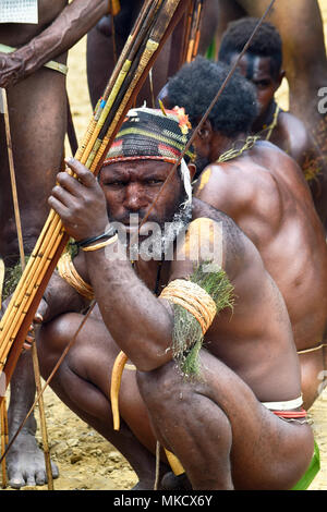 Wamena, Papua, Indonesia, 8/9/2016: Dani warriors at the Baliem Valley Festival Stock Photo