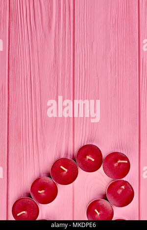 romantic candles from natural wax twisted with band made for holiday