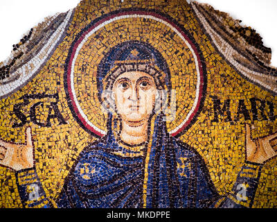 Ravenna, Italy - May 1, 2018: Mosaic on a gold background representing the Virgin Mary with her arms raised in prayer, according to a typically Byzant Stock Photo