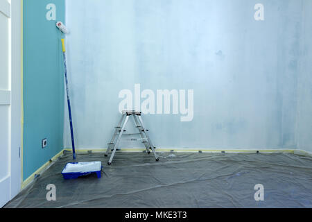 Painting tools on wall background Stock Photo