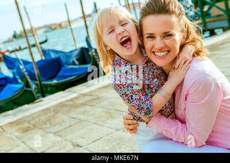 A little bit of the giggles is the magic ingredient for making touring fun with a child! Stock Photo