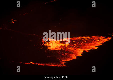 A living lava lake in the crater of El-Afar volcano, Erta-el, Ethiopia. Stock Photo