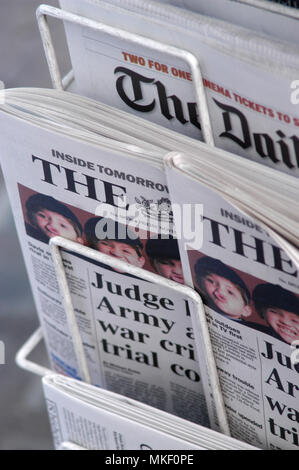 the times newspaper on news stand Stock Photo