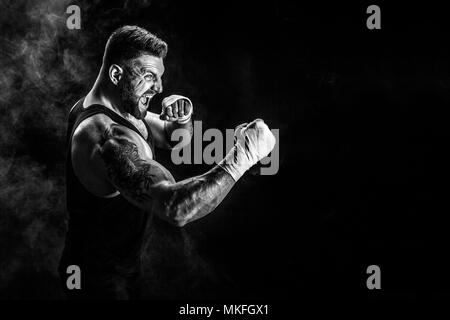 Sportsman Muay Thai Boxer Celebrating Flawless Victory in Boxing Cage.  Isolated on Black Background with Smoke. Copy Stock Image - Image of  people, handsome: 91121441