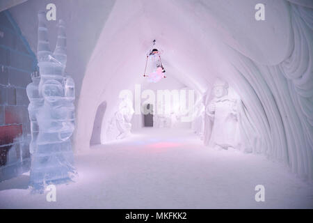 Chandelier and sculpture in gallery, Ice Hotel, Quebec, Canada Stock Photo