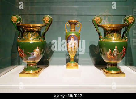 Napoleon's portrait painted on a Sèvres porcelain spindle vase and a pair of Etruscan scroll vases Stock Photo