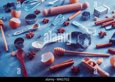 Pattern with baking tools and ingredients on a textured concrete background. Cooking utensils flat lay in a modern kitchen. Food preparation concept Stock Photo