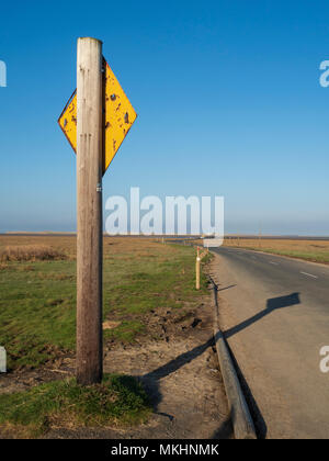 Lindisfarne Island causeway - tide times limit opening to vehicles to cross from the Northumberland mainland. Stock Photo