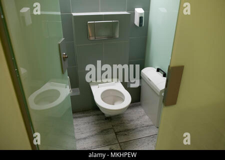 Toilet in a public restroom Stock Photo