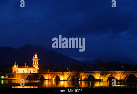 Igreja de Santo António da Torre Velha catholic church next to the medieval bridge over the Lima river in Ponte de Lima, Portugal, Europe Stock Photo