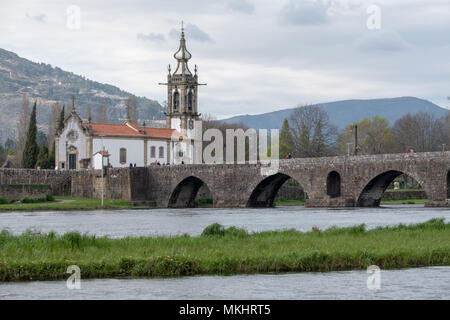 Igreja de Santo António da Torre Velha catholic church next to the medieval bridge over the Lima river in Ponte de Lima, Portugal, Europe Stock Photo