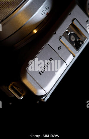 Close up of a Fujifilm X-A3 digital mirrorless camera with the 15-45 mm zoom lens Stock Photo