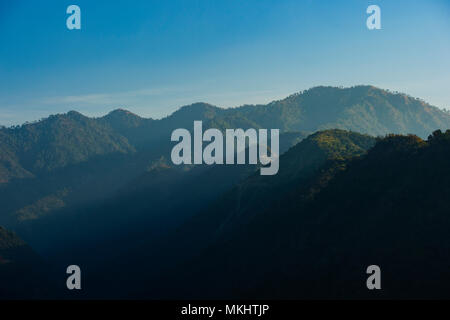 Wonderful green peaks of some mountains in Rishikesh, India Stock Photo