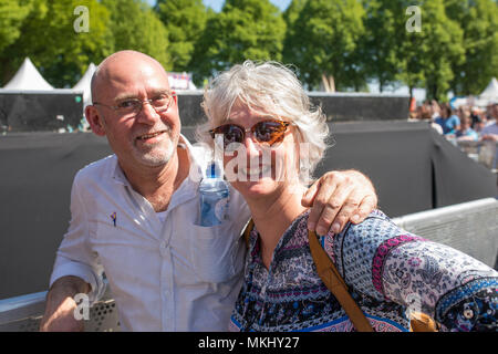 Middle aged couple enjoying music at liberation feast in the Netherlands Stock Photo