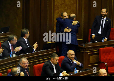 Yerevan, Armenia. 8th May, 2018. New Prime Minister Nikol Pashinyan (Central L) celebrates with friends in the parliament in Yerevan, Armenia, on May 8, 2018. The Armenian Parliament Tuesday elected opposition leader Nikol Pashinyan as the country's prime minister. Credit: Gevorg Ghazaryan/Xinhua/Alamy Live News Stock Photo