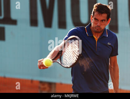 Madrid, Spain. 8th May, 2018. Guillermo Garcia Lopez of Spain plays a backhand to Ryan Harrison of USA in the 2nd Round match during day four of the Mutua Madrid Open tennis tournament at the Caja Magica. Credit: Manu Reino/SOPA Images/ZUMA Wire/Alamy Live News Stock Photo
