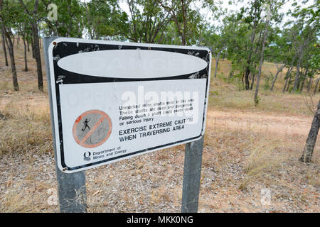 Caution sign warning against open mine shafts at Maytown, an old gold rush ghost town, Far North Queensland, FNQ, QLD, Australia Stock Photo