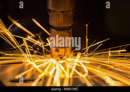 Close up spot welding nut to steel part Stock Photo