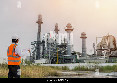 Engineer is checking gas turbine electric power plant Stock Photo