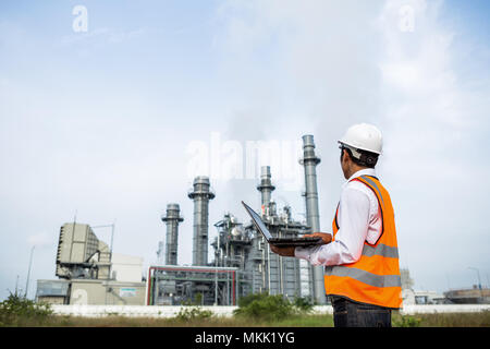 Engineer is checking gas turbine electric power plant Stock Photo