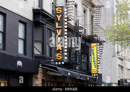 Sylvia's Restaurant, 328 Malcolm X Blvd, New York, NY. exterior storefront of a soul food restaurant in the Harlem neighborhood of Manhattan. Stock Photo