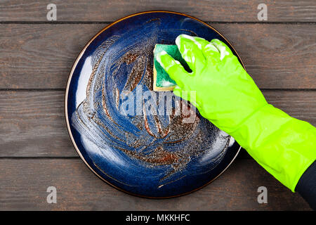 Blue plate on brown wooden table Stock Photo