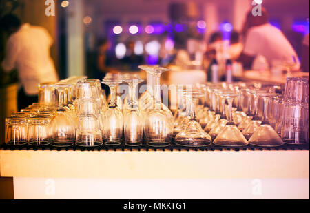 Empty glasses on bar counter. Close up Stock Photo