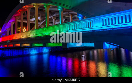 Rainbow colors on the Elgin Bridge in Singapore at night Stock Photo