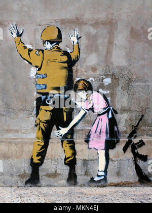 Banksy, soldier and girl, Bethlehem, Palestine Stock Photo