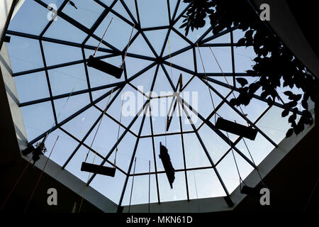 Silhouette under a glass dome, Blue sky with frame silhouette Stock Photo