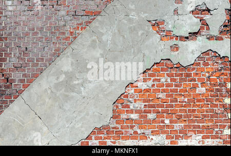 Old brick wall with concrete pieces Stock Photo