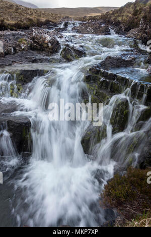 Waterfall in mountain stream of Allt Dearg Mor, Sligachan, Isle of Skye, Scotland, UK Stock Photo