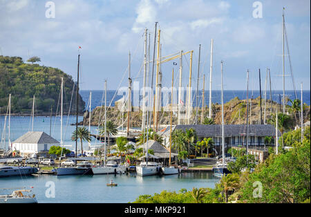 Antigua Lesser Antilles islands in the Caribbean West Indies - View across English Harbour home to Nelsons Dockyard with expensive yachts moored Stock Photo