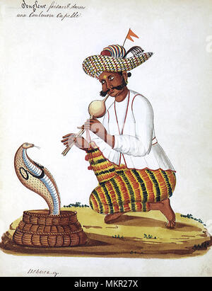 Inian man snake charmer Stock Photo