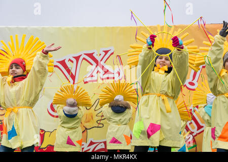 TIRASPOL, MOLDOVA - FEBRUARY 18, 2018: Children's ensemble performs at the Maslenitsa festival. The slavonic pagan holiday Maslenitsa (Shrovetide) - a Stock Photo