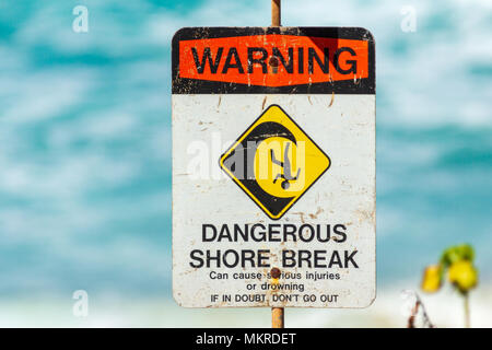 WARNING DANGEROUS SHORE BREAK sign Can cause serious injuries or drowning  IF IN DOUBT, DON'T GO OUT Stock Photo