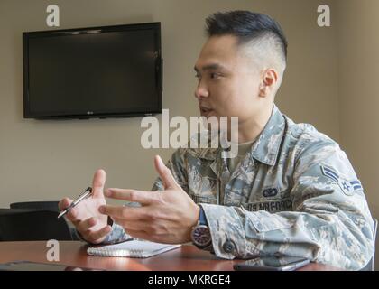 Airman First Class Junhao Yu conducts an interview at the 102nd Intelligence Wing, Otis Air National Guard Base, Mass. on May 5, 2018, May 5, 2018. () Stock Photo